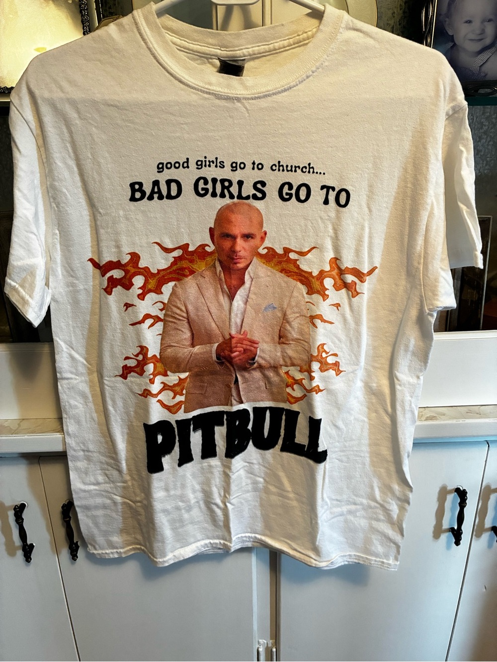 Graphic Tee - White "Bad Girls Go to Pitbull’ size Large